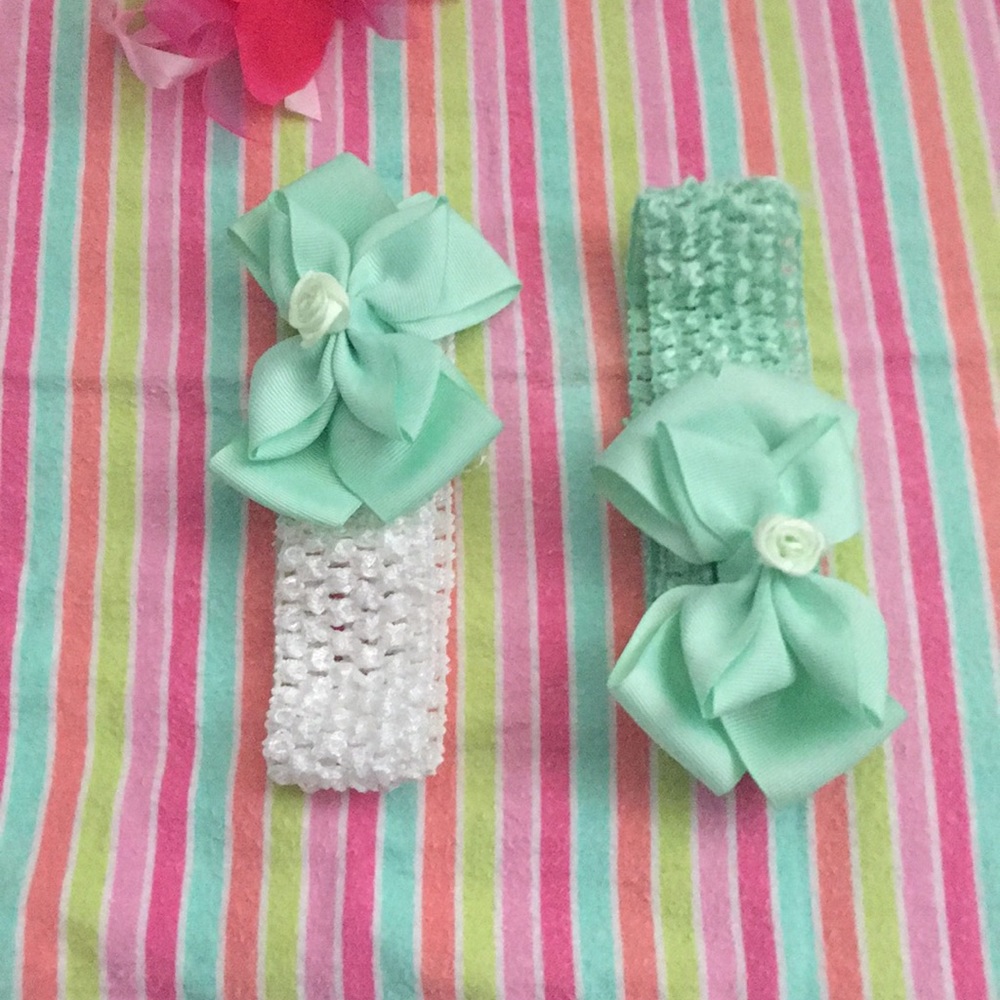 Mint green hair bow. Sold separately. New.